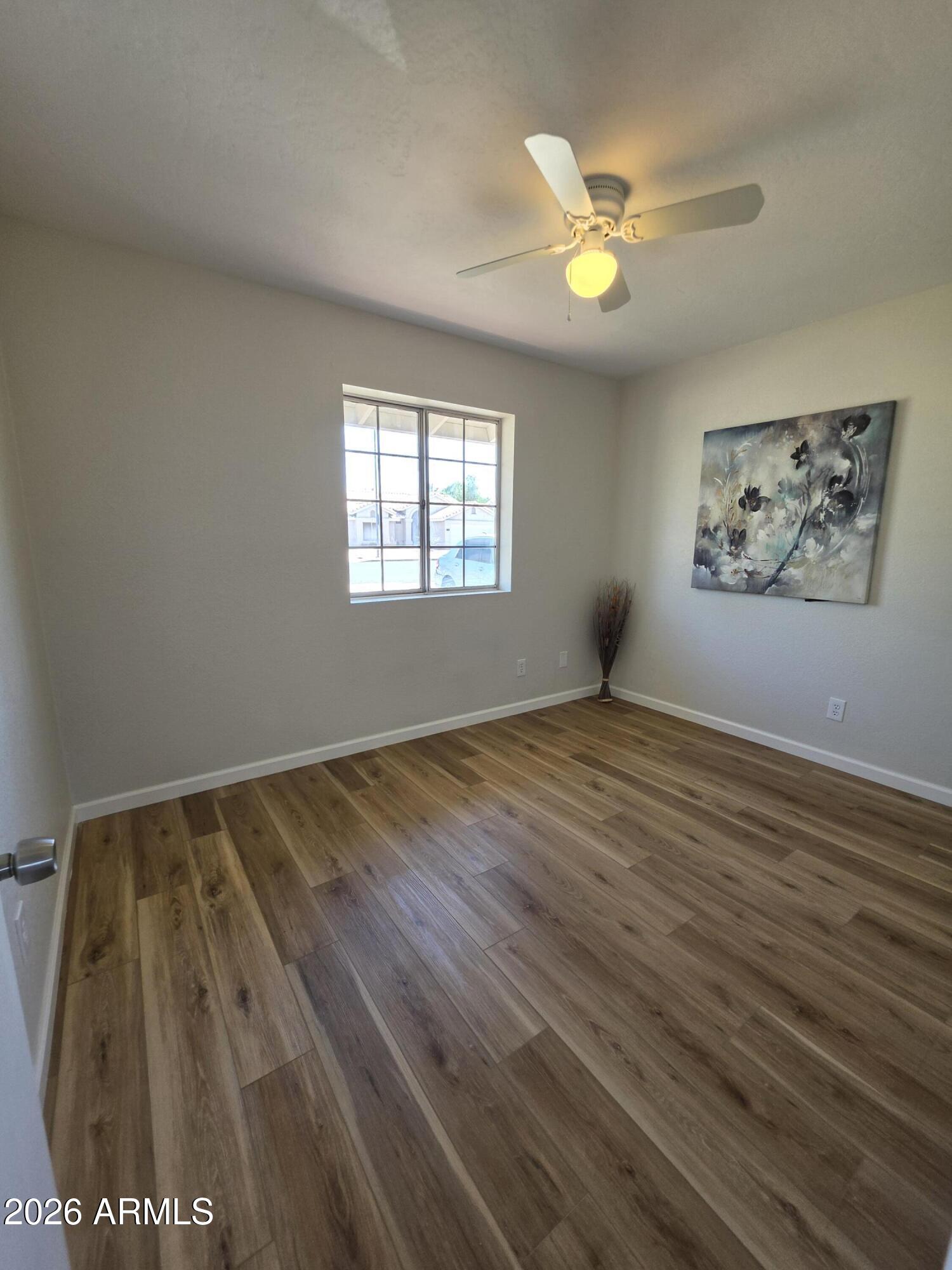 46 East McLellan Road Mesa, AZ 85201 - Photo 13 of 18 a view of an empty room and window