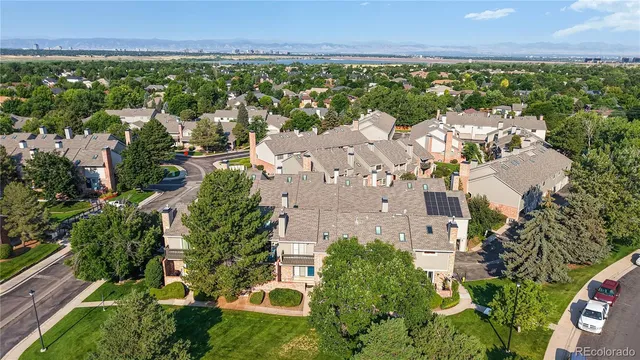 an aerial view of a house with a garden