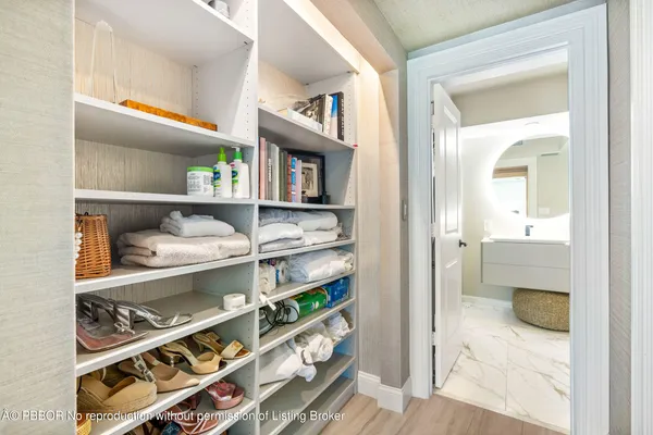 a room with a wooden shelves