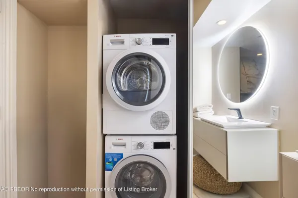a utility room with dryer and washer