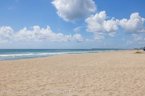 a view of beach and lake