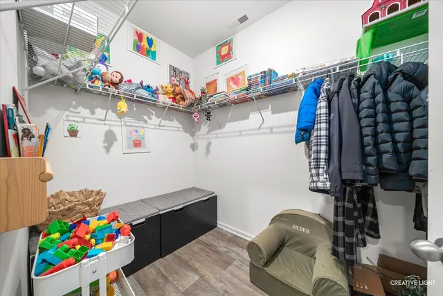 an aerial view of a house with big yard