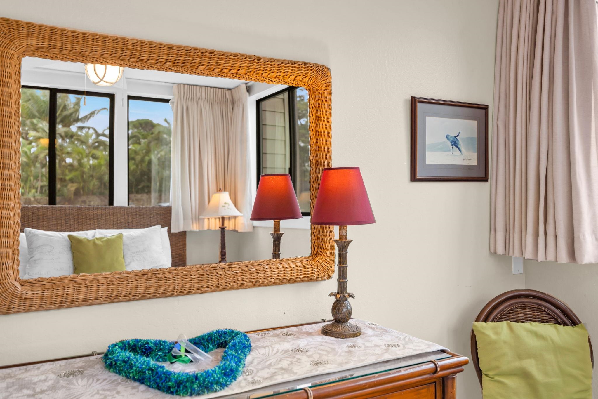 4057 Lower Honoapiilani Road, Unit 116 Lahaina, HI 96761 - Photo 13 of 38 a living room with furniture and a window