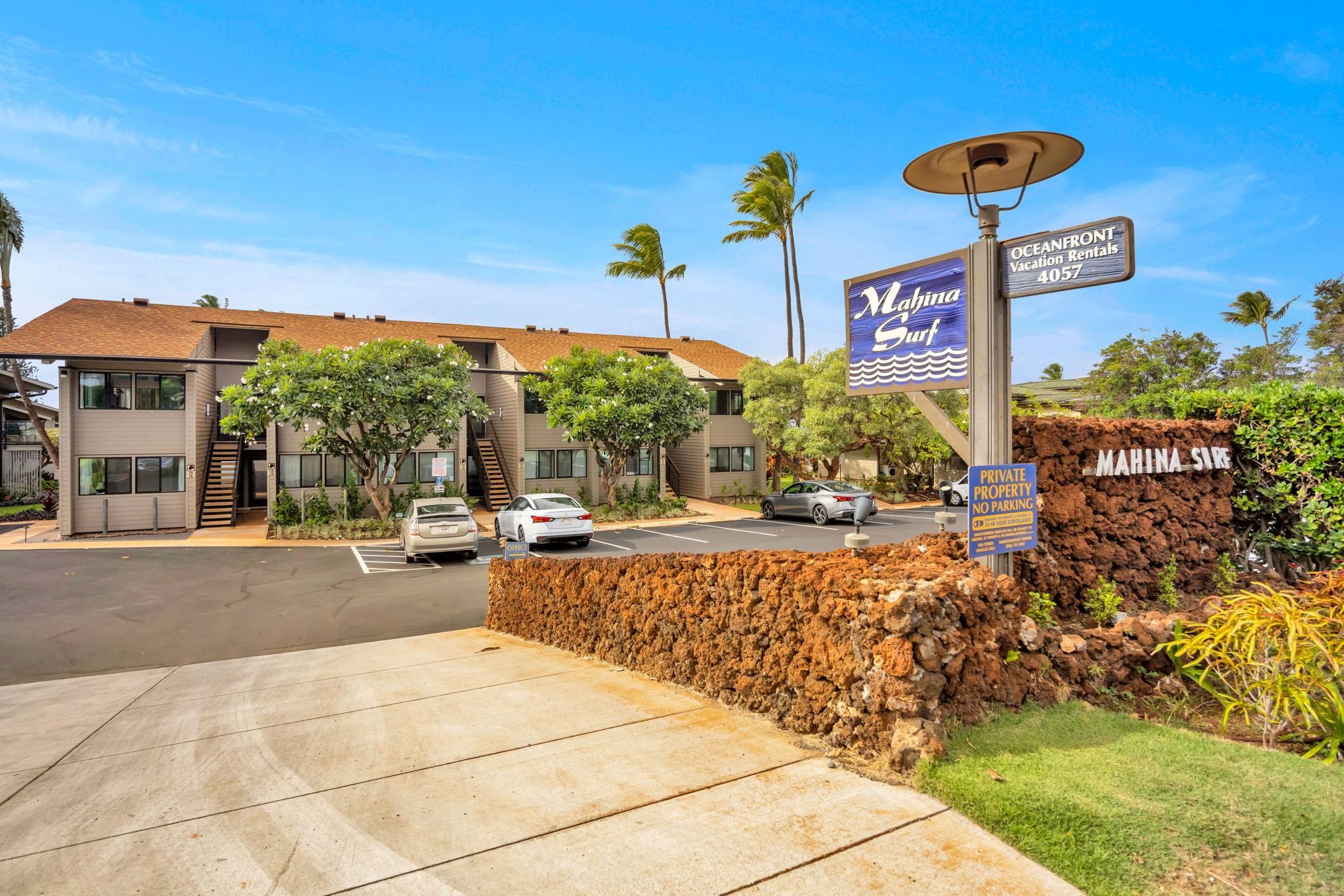 4057 Lower Honoapiilani Road, Unit 116 Lahaina, HI 96761 - Photo 38 of 38 a view of a street with potted plants