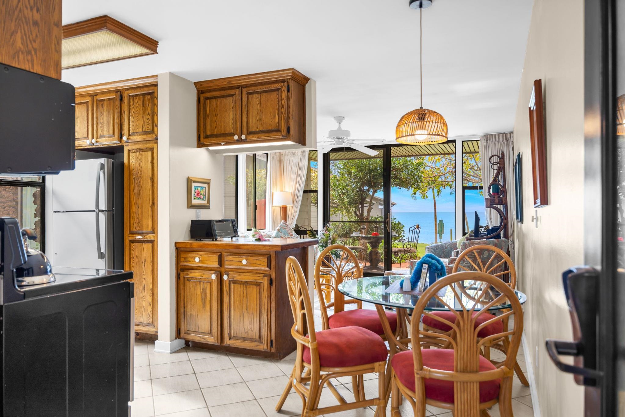 4057 Lower Honoapiilani Road, Unit 116 Lahaina, HI 96761 - Photo 5 of 38 a front view of a house with outdoor seating