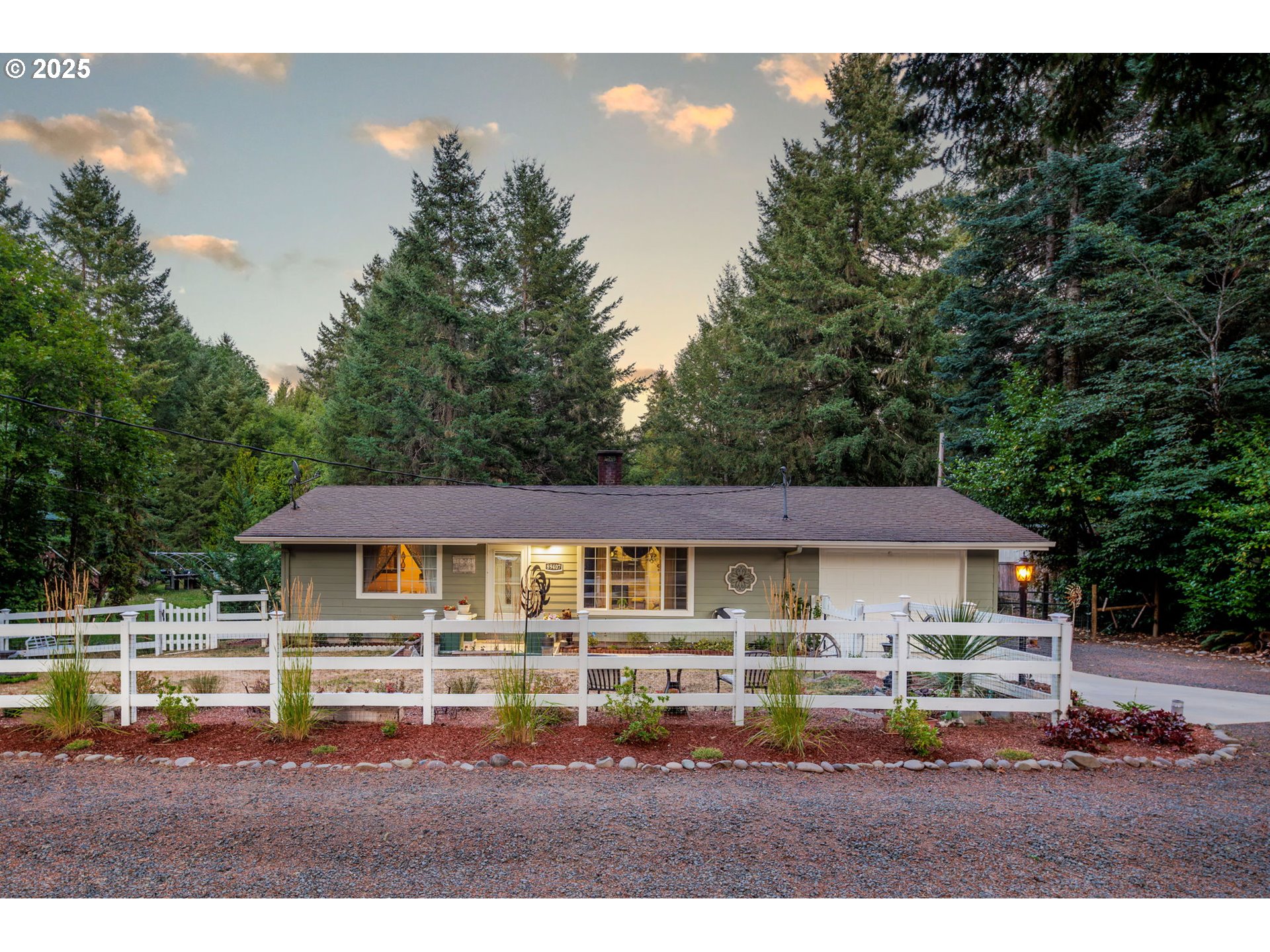 a view of house with a big yard