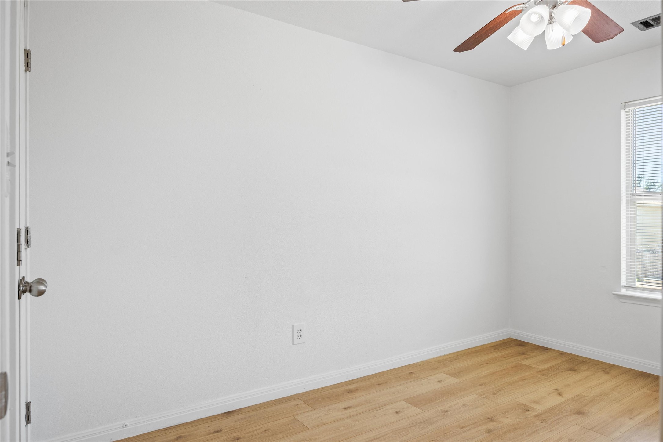 4516 Kind Way, Unit 253 Austin, TX 78725 - Photo 12 of 31 an empty room with a window