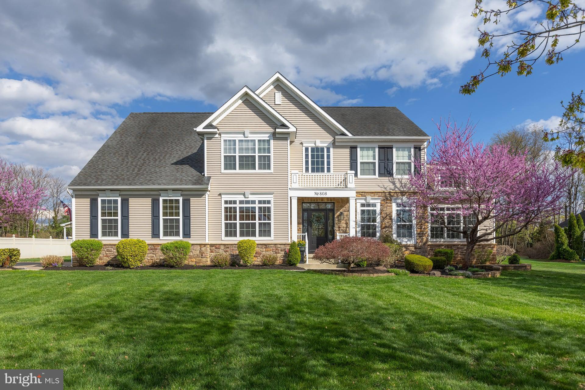 Charming home with vibrant landscaping