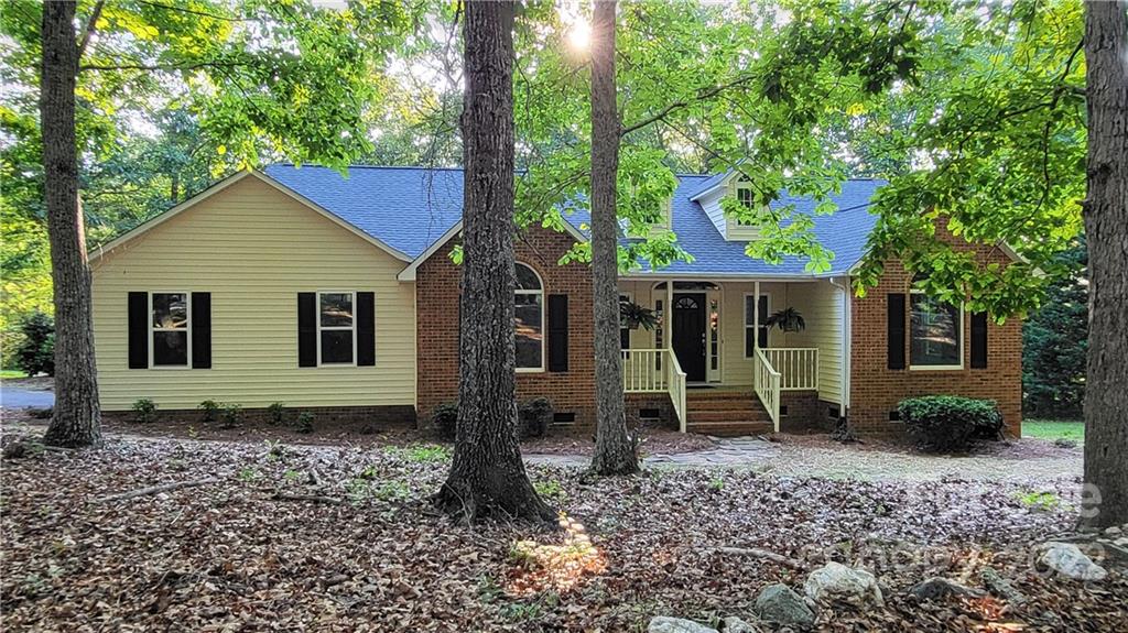 4324 Dye Road Edgemoor, SC 29712 - Photo 1 of 33 a backyard of a house with barbeque oven table and chairs