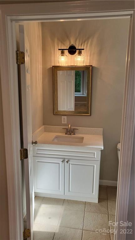 4324 Dye Road Edgemoor, SC 29712 - Photo 19 of 33 a bathroom with a sink and a mirror