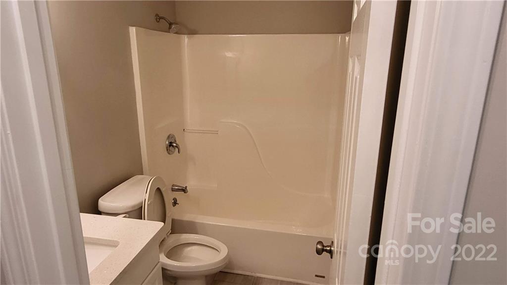 4324 Dye Road Edgemoor, SC 29712 - Photo 24 of 33 a white toilet sitting next to a shower