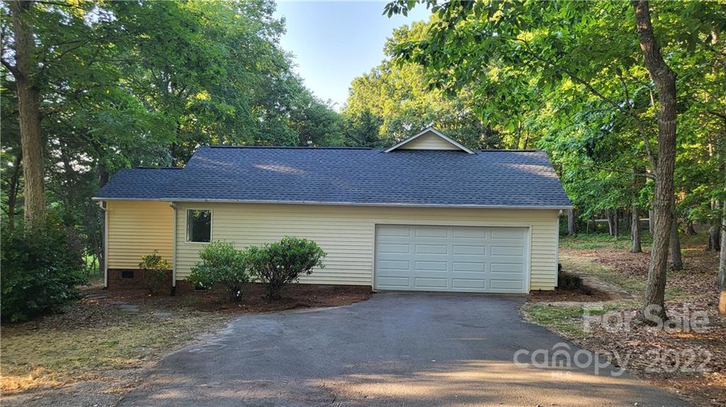 4324 Dye Road Edgemoor, SC 29712 - Photo 28 of 33 a front view of a house with a yard and garage