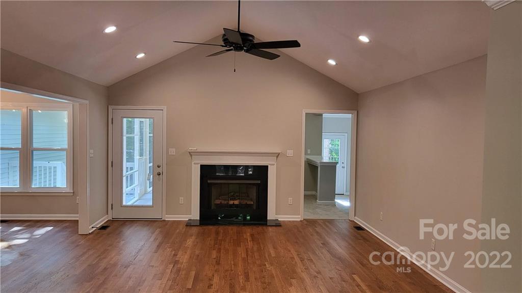 4324 Dye Road Edgemoor, SC 29712 - Photo 4 of 33 a view of an empty room with a fireplace and a window