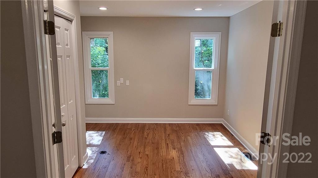 4324 Dye Road Edgemoor, SC 29712 - Photo 9 of 33 a view of hallway with a window and wooden floor