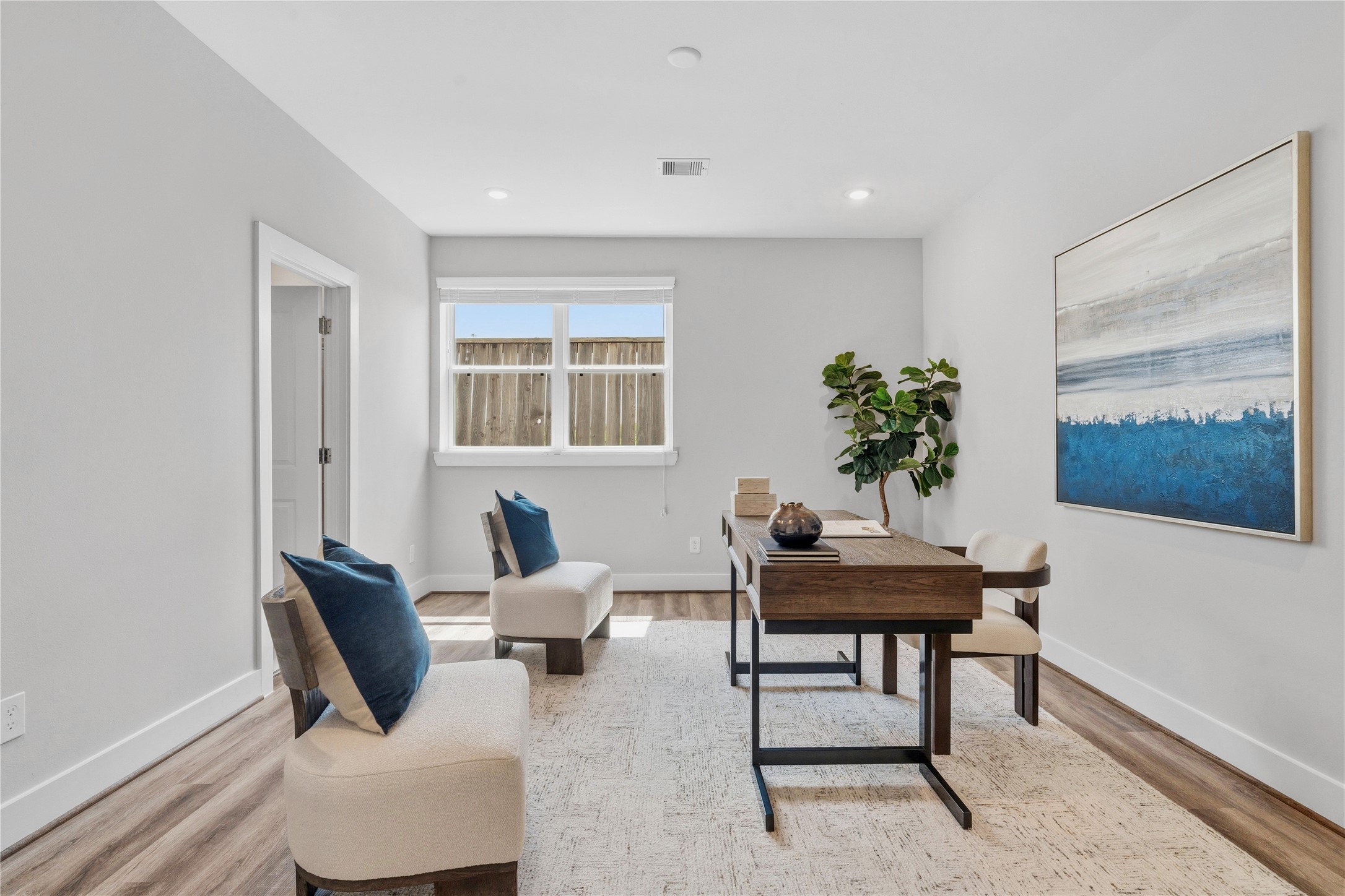1284 North Post Oak Road, Unit B Houston, TX 77055 - Photo 4 of 37 Versatile first-floor space ideal for a bedroom or home office.