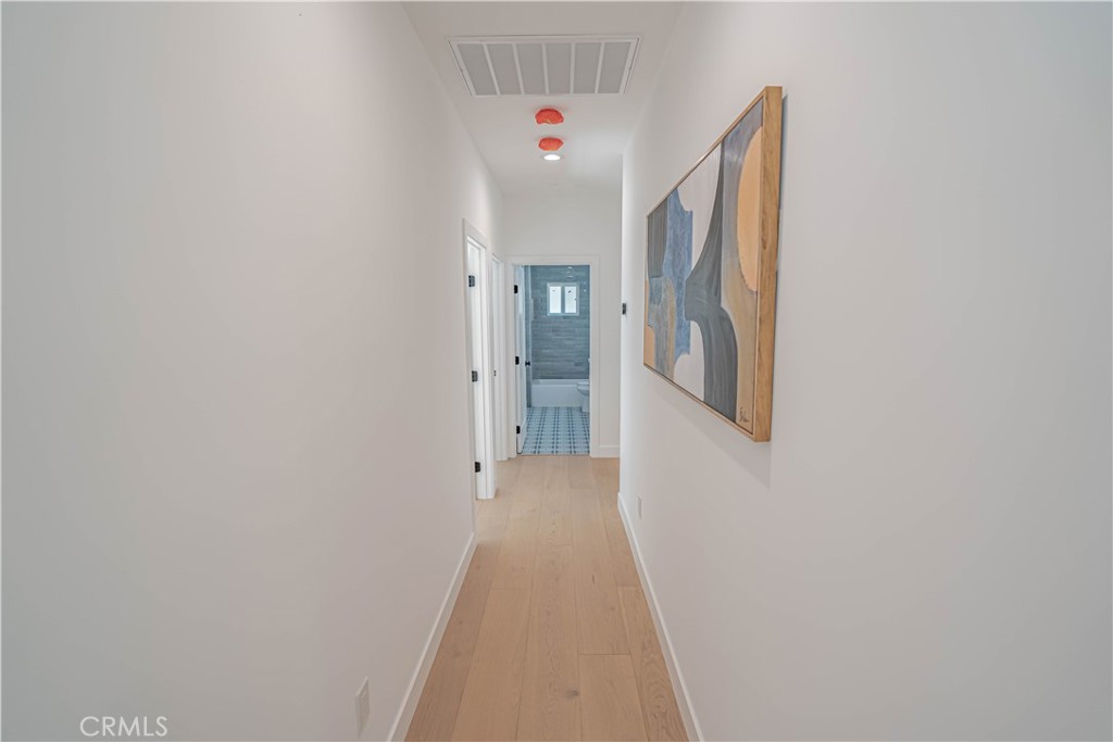 4134 Big Tujunga Canyon Road Tujunga, CA 91042 - Photo 16 of 44 a view of a hallway with wooden floor