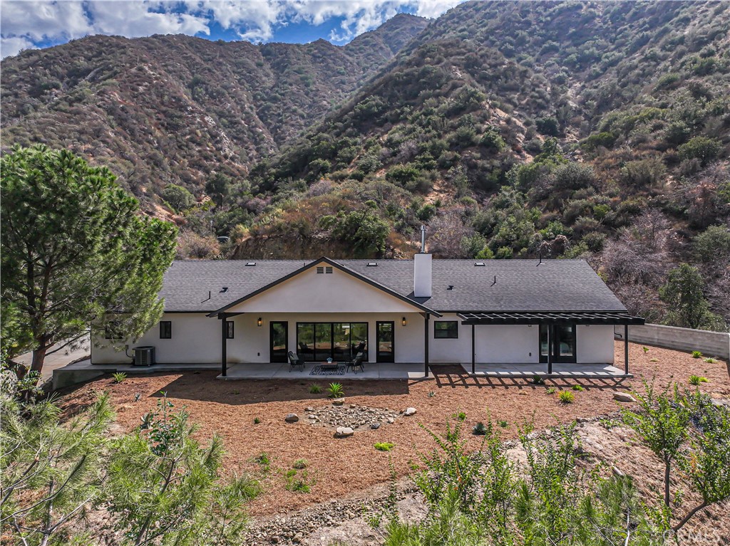 4134 Big Tujunga Canyon Road Tujunga, CA 91042 - Photo 3 of 44 front view of a house with a yard
