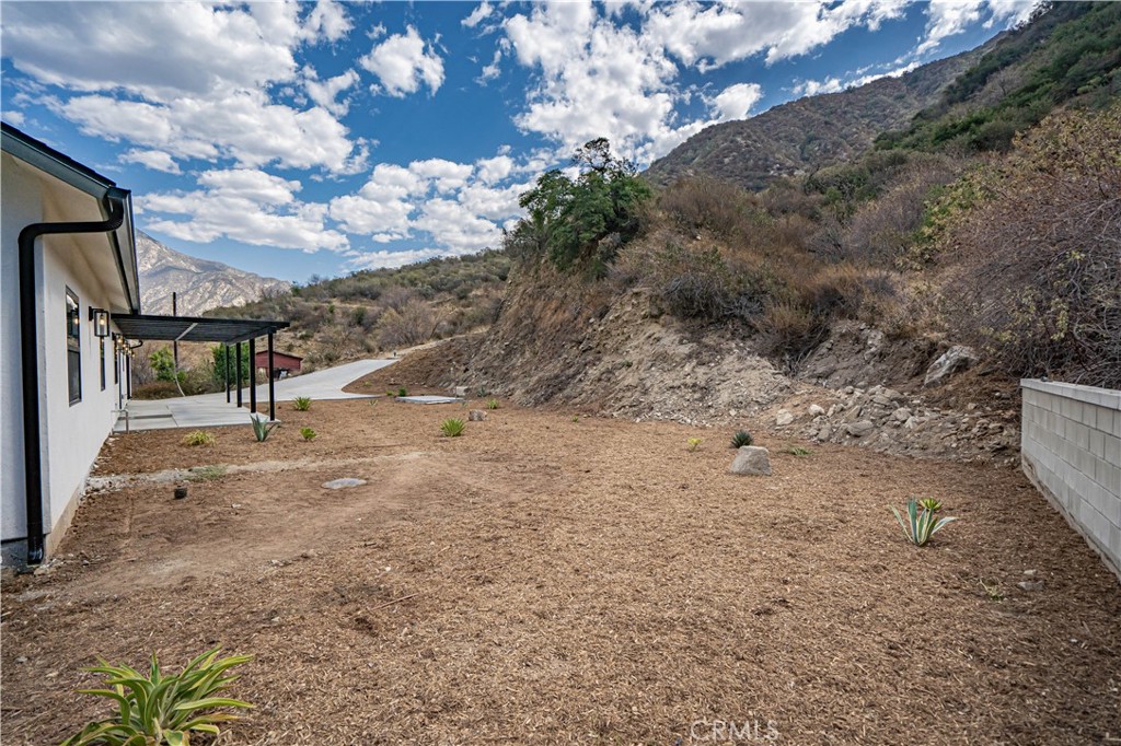 4134 Big Tujunga Canyon Road Tujunga, CA 91042 - Photo 35 of 44 a view of a yard with wooden fence