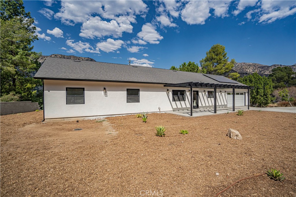 4134 Big Tujunga Canyon Road Tujunga, CA 91042 - Photo 36 of 44 front view of a house with a yard
