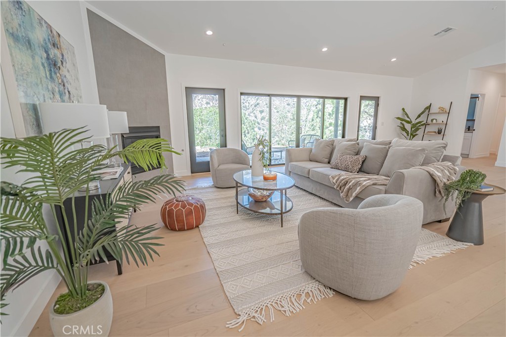4134 Big Tujunga Canyon Road Tujunga, CA 91042 - Photo 4 of 44 a living room with patio furniture and a potted plant