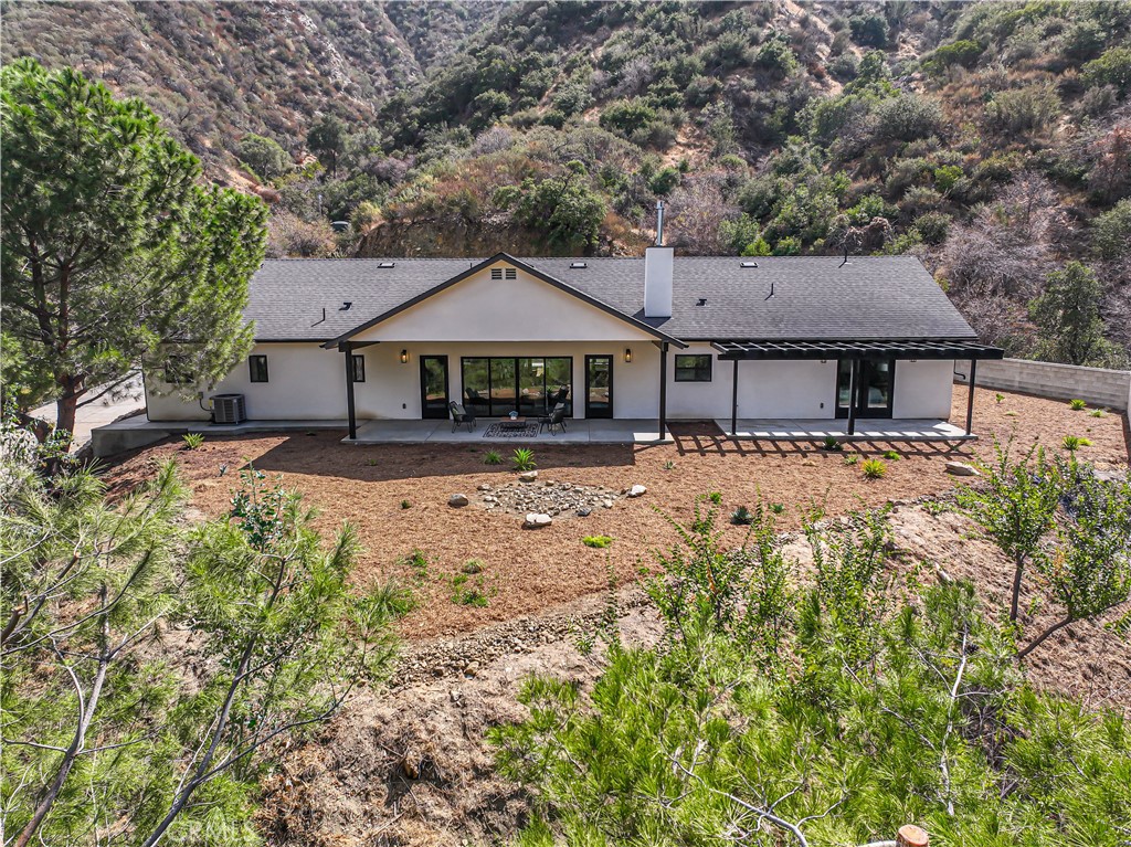 4134 Big Tujunga Canyon Road Tujunga, CA 91042 - Photo 41 of 44 a front view of a house with a yard