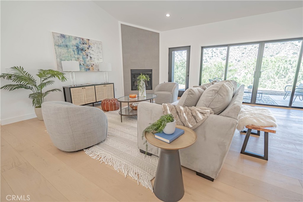4134 Big Tujunga Canyon Road Tujunga, CA 91042 - Photo 6 of 44 a living room with furniture and a large window