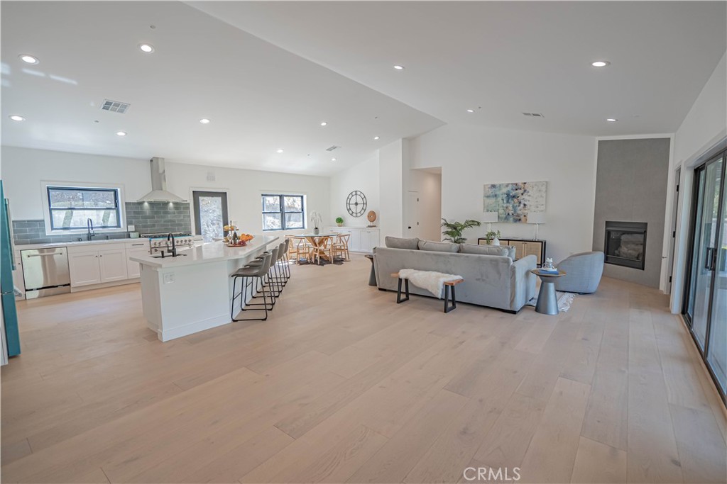 4134 Big Tujunga Canyon Road Tujunga, CA 91042 - Photo 7 of 44 a living room with furniture and a kitchen