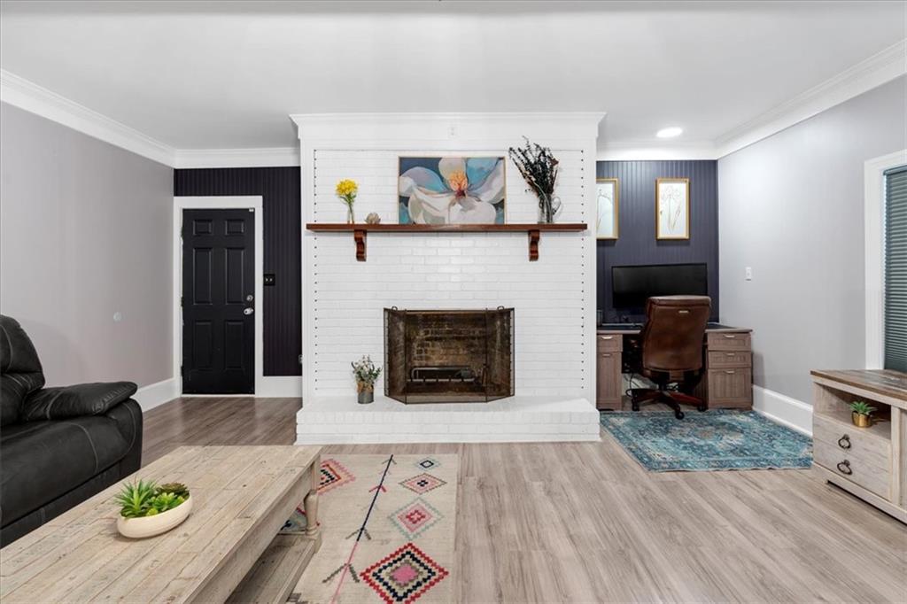 8 South Hughes Street Rome, GA 30165 - Photo 14 of 28 a living room with furniture and a fireplace