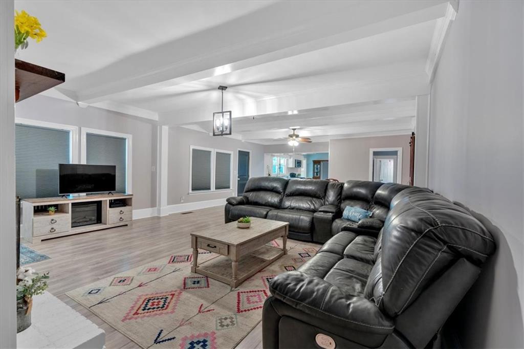 8 South Hughes Street Rome, GA 30165 - Photo 15 of 28 a living room with furniture and a flat screen tv