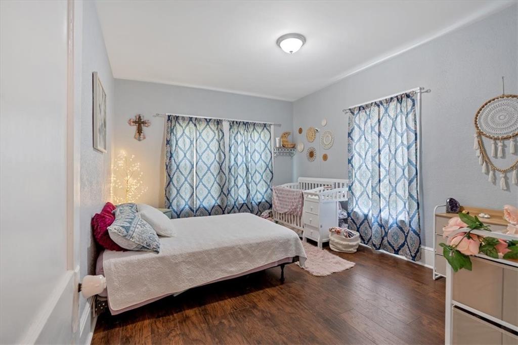 8 South Hughes Street Rome, GA 30165 - Photo 20 of 28 a bedroom with a bed and a window