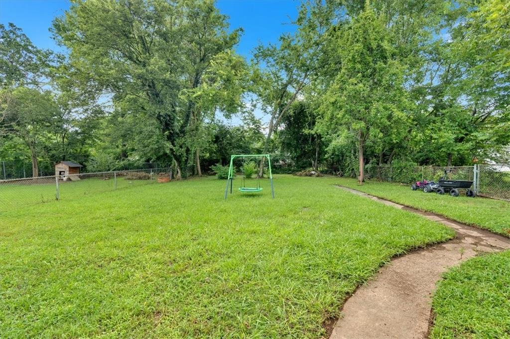 8 South Hughes Street Rome, GA 30165 - Photo 23 of 28 a front view of a house with a yard