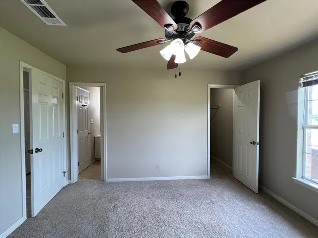 a kitchen with a sink a stove a microwave and cabinets