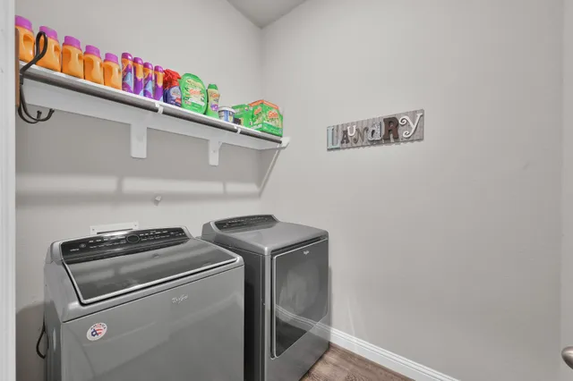 a utility room with dryer and washer