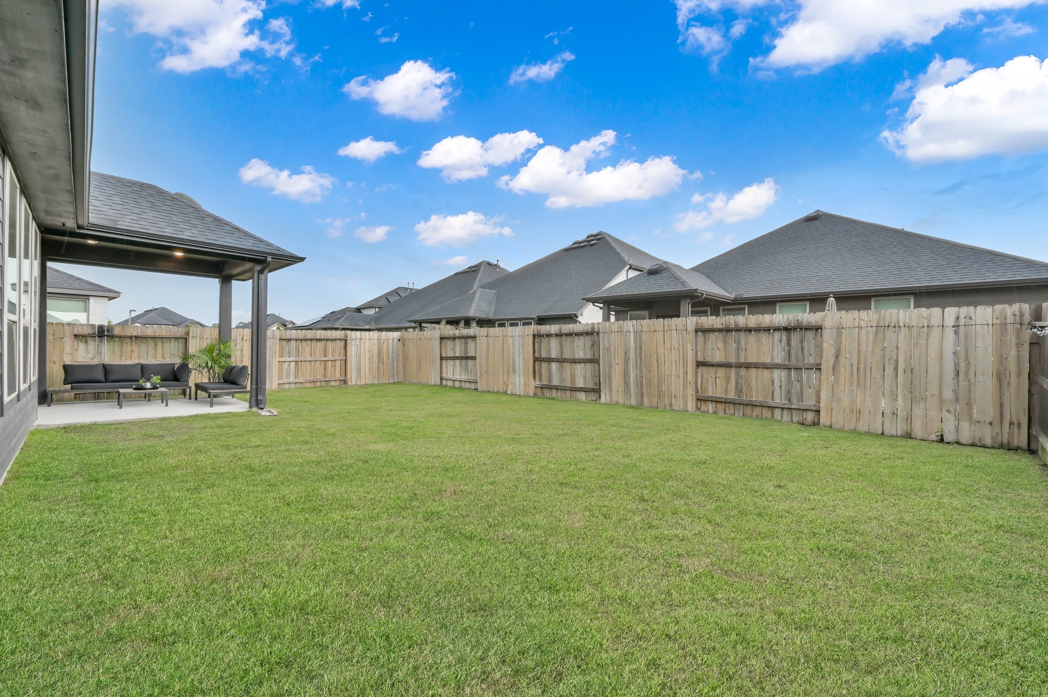 17413 Turtleweed Lane Conroe, TX 77385 - Photo 21 of 27 a view of a backyard with a garden and staircase