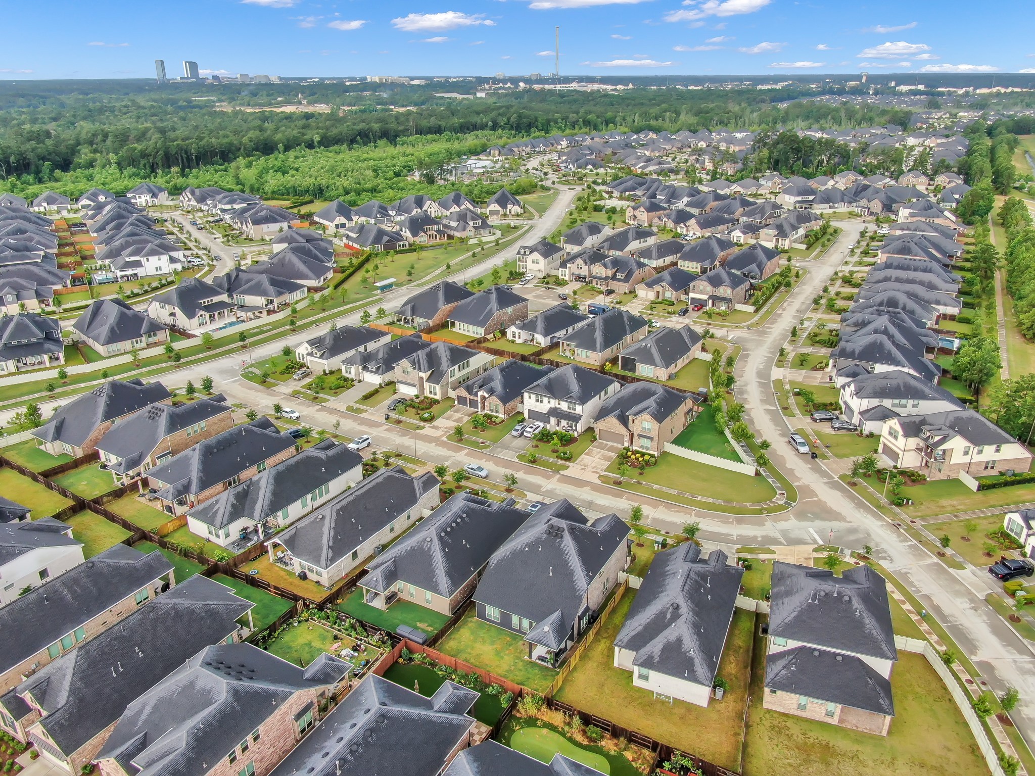 17413 Turtleweed Lane Conroe, TX 77385 - Photo 26 of 27 an aerial view of residential houses with outdoor space