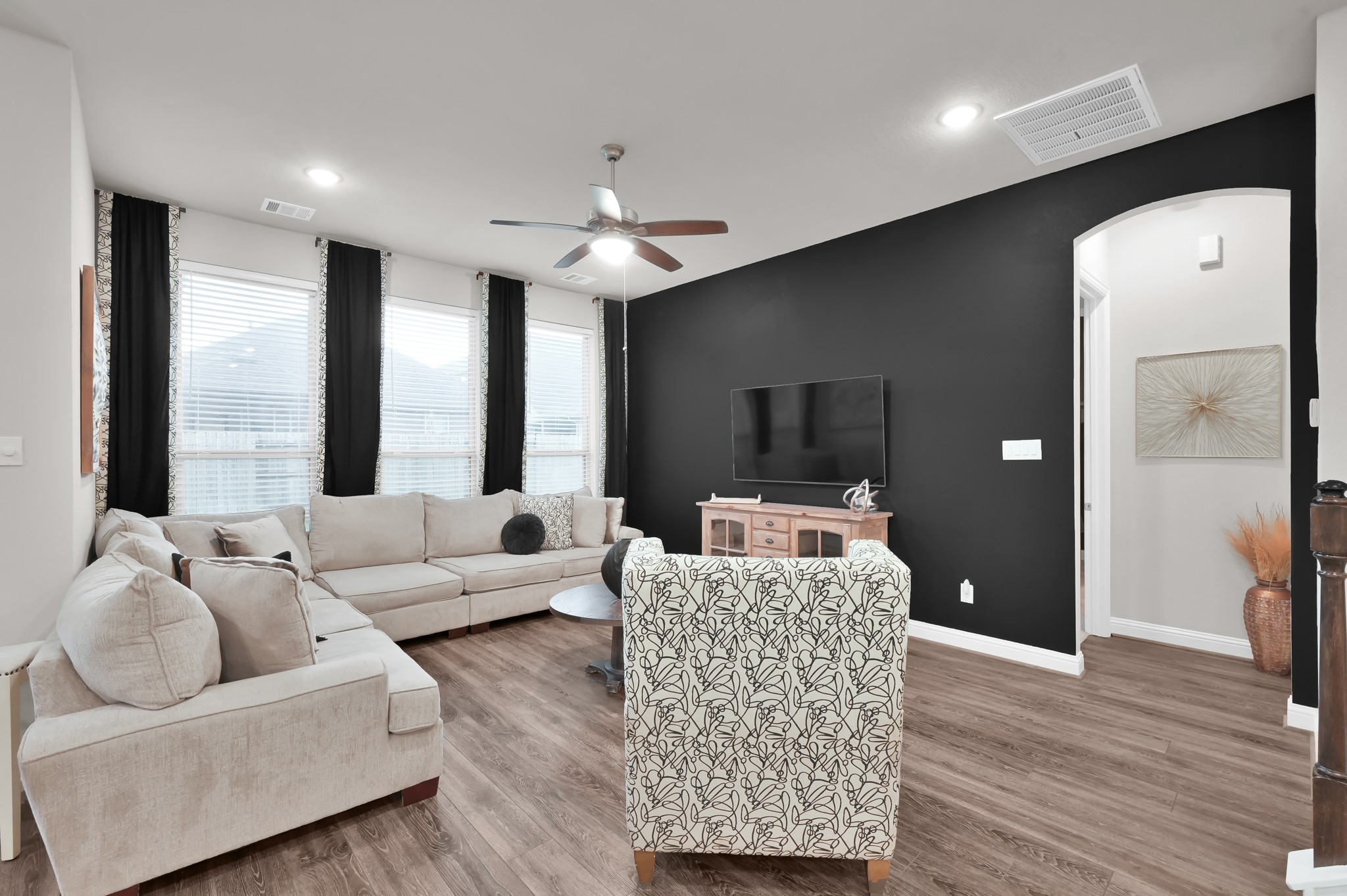 17413 Turtleweed Lane Conroe, TX 77385 - Photo 4 of 27 a living room with furniture and a large window