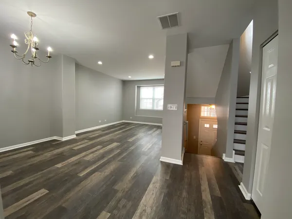 a view of livingroom with hardwood floor and window