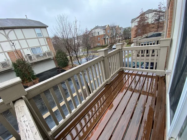 a view of balcony with furniture