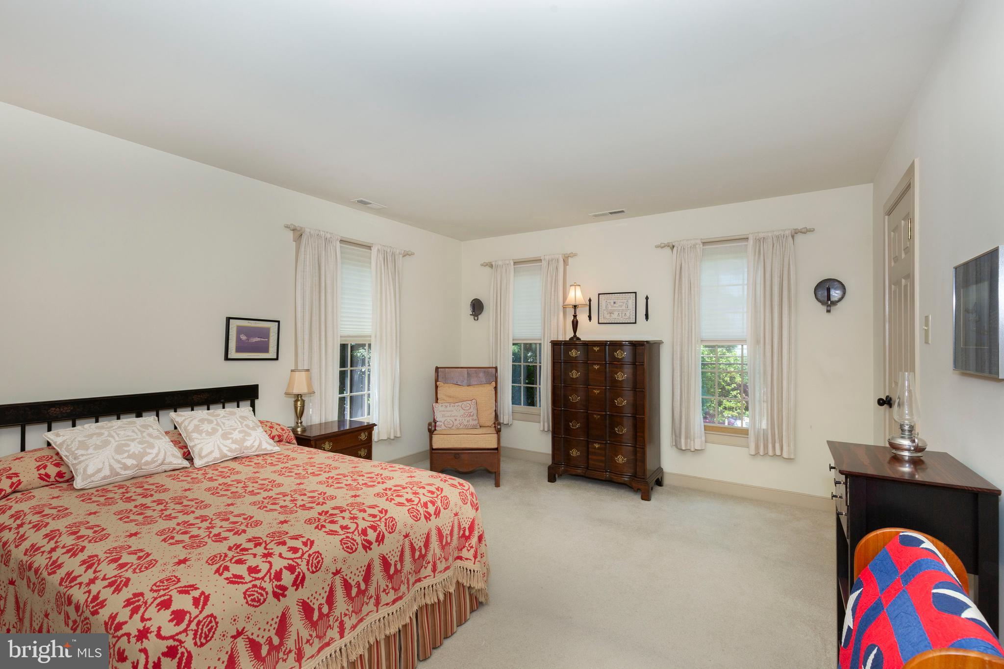 5501 Woodlyn Road Frederick, MD 21703 - Photo 36 of 51 a bedroom with a bed and a television