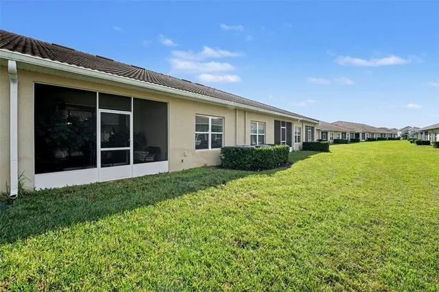 a view of a house with a garden