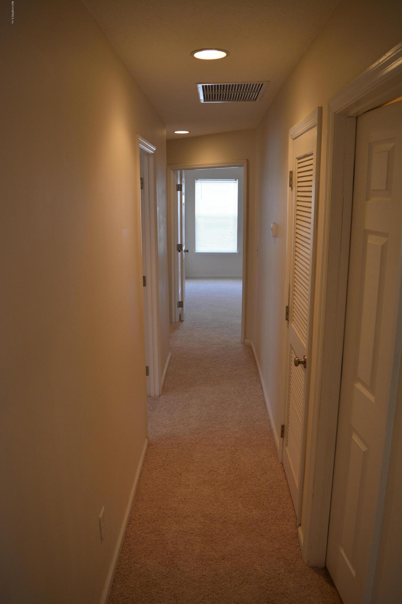10142 Sandler Road Jacksonville, FL 32222 - Photo 19 of 33 a view of hallway with livingroom