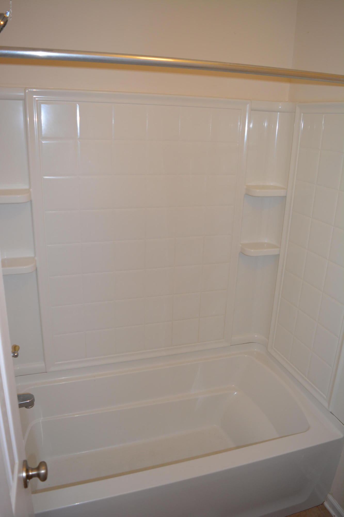 10142 Sandler Road Jacksonville, FL 32222 - Photo 31 of 33 a bathroom with a shower