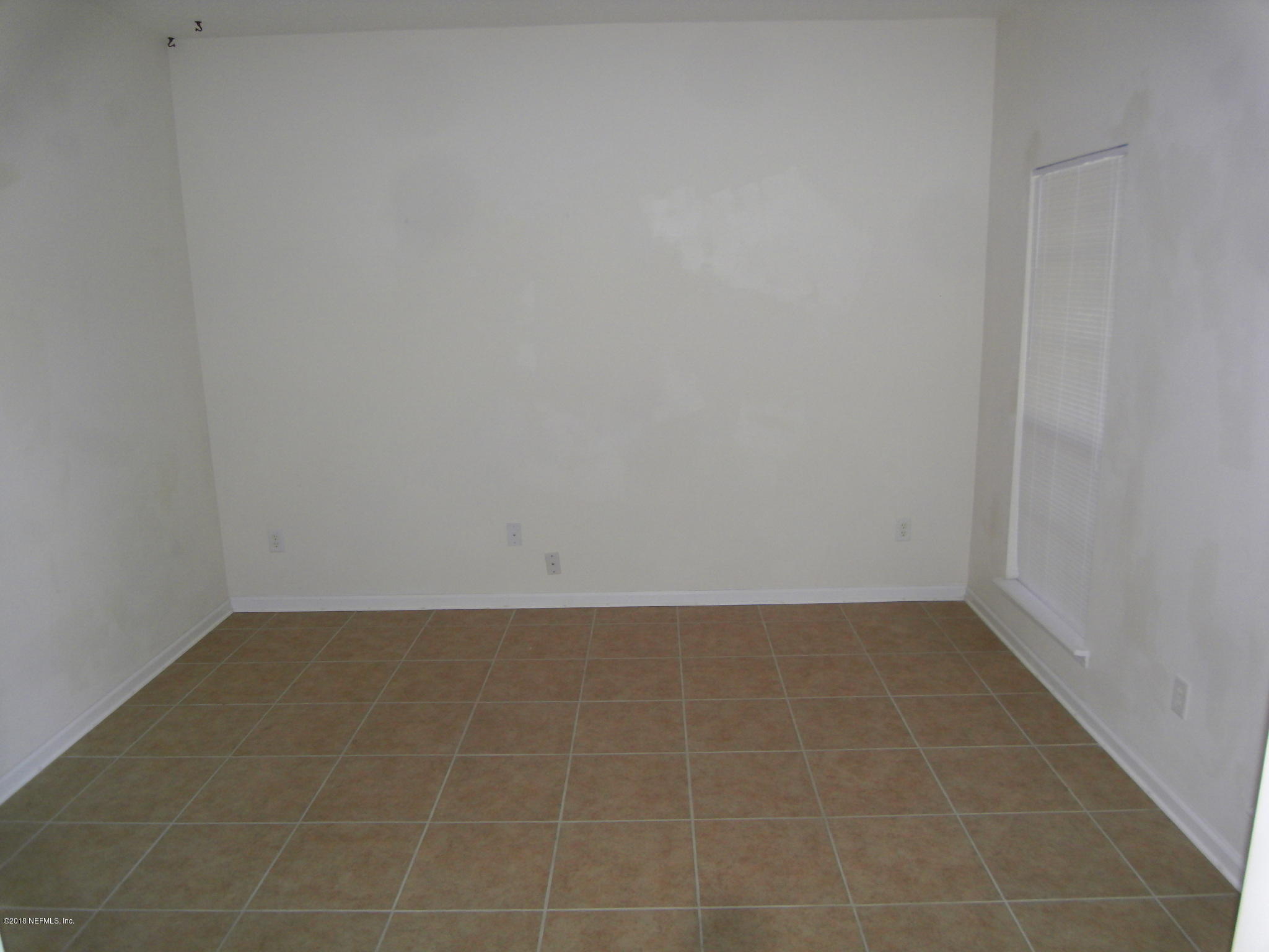 10142 Sandler Road Jacksonville, FL 32222 - Photo 5 of 33 a view of a room with an empty space