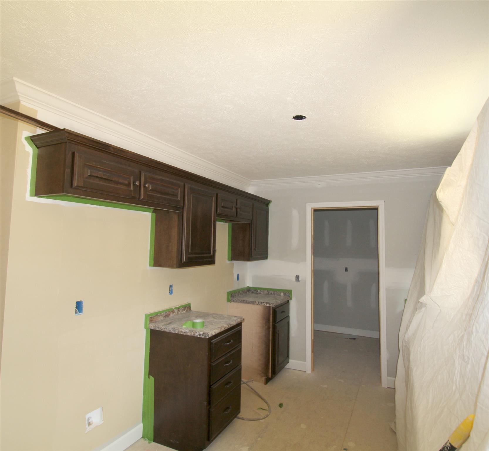 38 Ferrells Loop Road Manchester, TN 37355 - Photo 3 of 8 a view of a kitchen with refrigerator and microwave