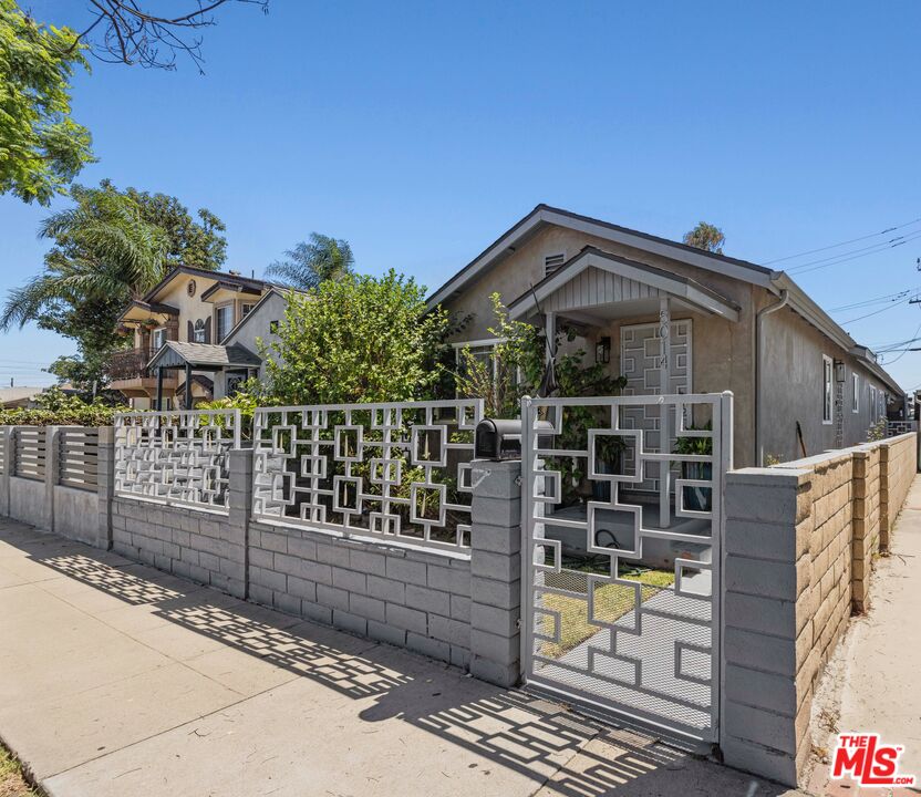 a front view of a house with a garage