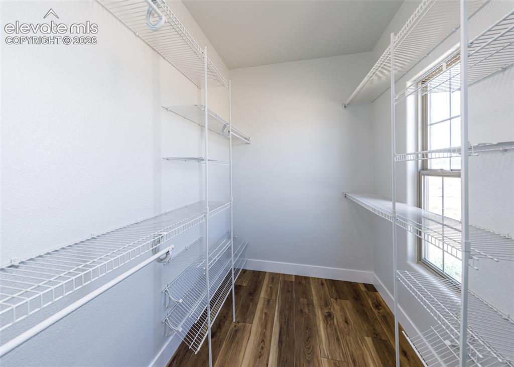 1120 Newton Road Pueblo, CO 81005 - Photo 17 of 46 a view of a room with racks on the wall