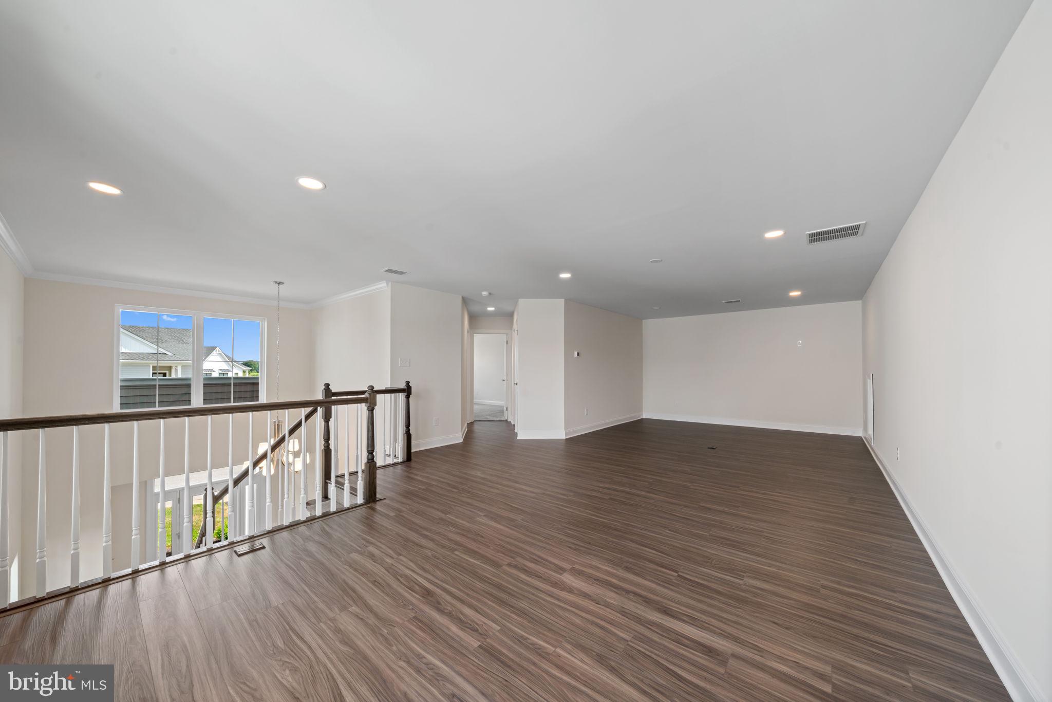 627 Appaloosa Road, Unit 251 Downingtown, PA 19335 - Photo 24 of 34 a view of empty room with wooden floor