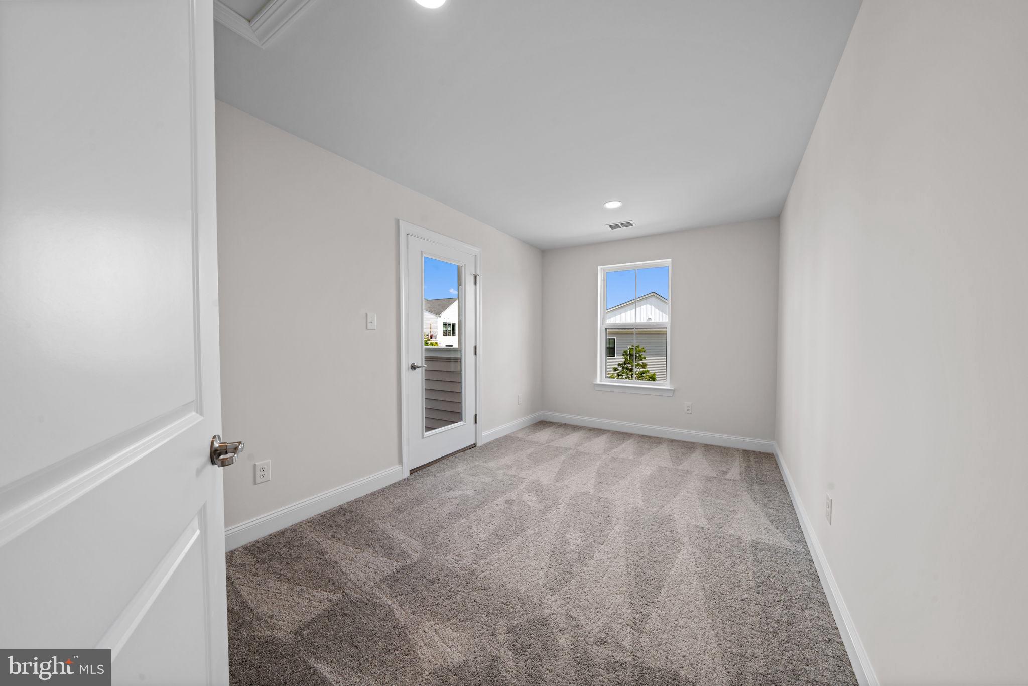 627 Appaloosa Road, Unit 251 Downingtown, PA 19335 - Photo 25 of 34 an empty room with windows