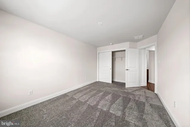 a view of a balcony with wooden floor