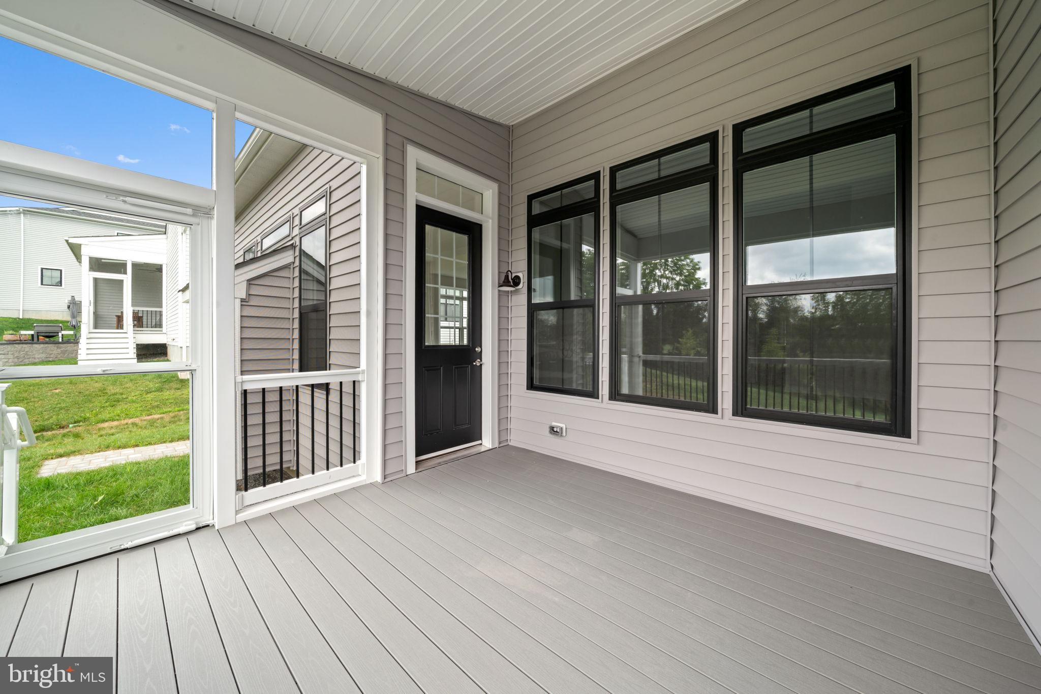627 Appaloosa Road, Unit 251 Downingtown, PA 19335 - Photo 33 of 34 wooden floor and window in an empty room